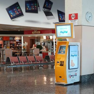 TravelersBox machine Convertir des monnaies étrangères en crédit iTunes avec TravelersBox