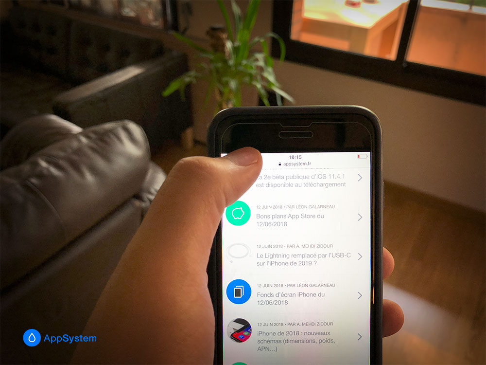 Comment atteindre rapidement le haut d'une page sur iOS