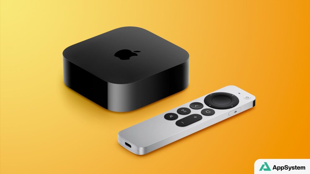 Boîtier Apple TV noir accompagné de sa télécommande argentée