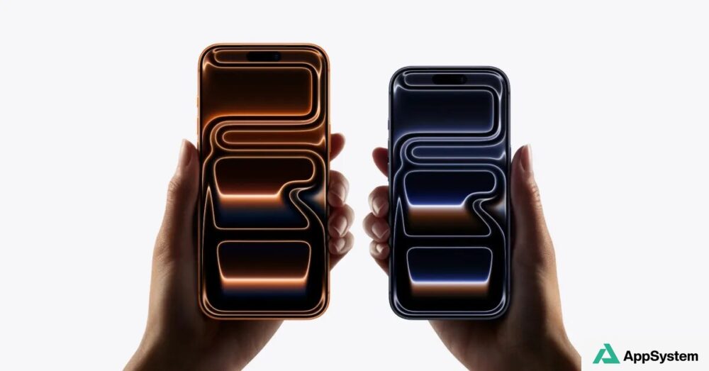Deux smartphones Apple tenus côte à côte, aux écrans orange et bleu