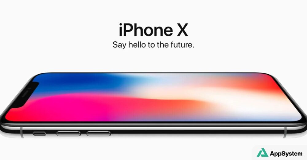 iPhone X présenté horizontalement sur fond blanc