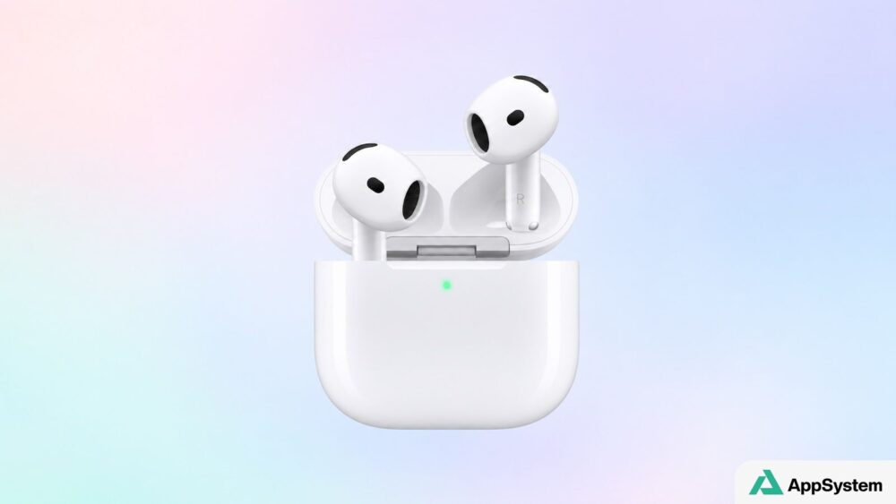 AirPods 5 blancs dans leur boîtier de charge ouvert