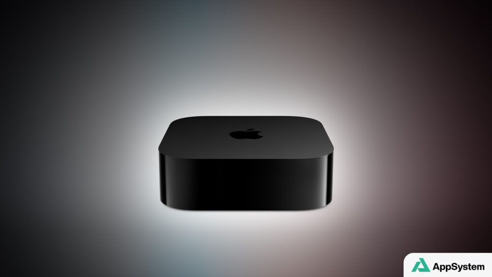 Boîtier noir Apple TV 4K présenté sur fond sombre