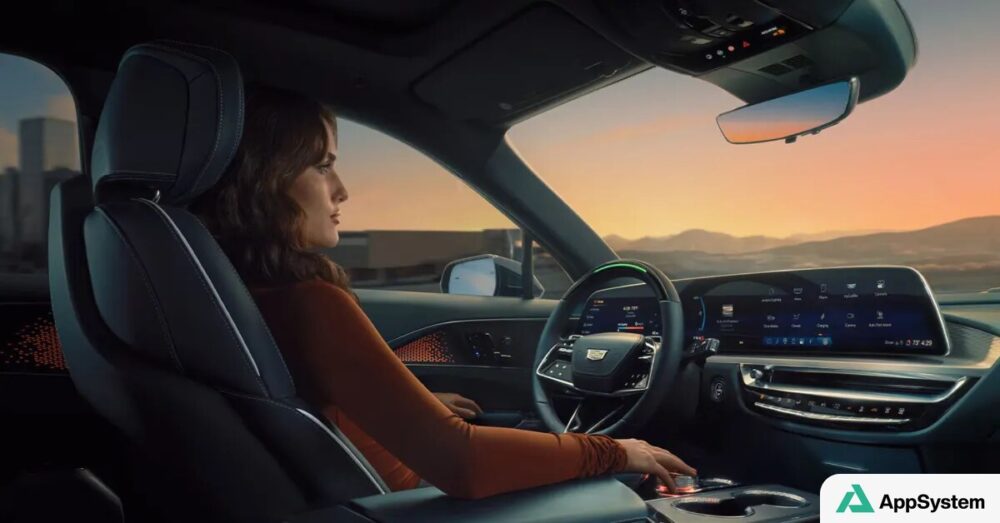Habitacle du Cadillac Lyriq avec conductrice et écran multimédia