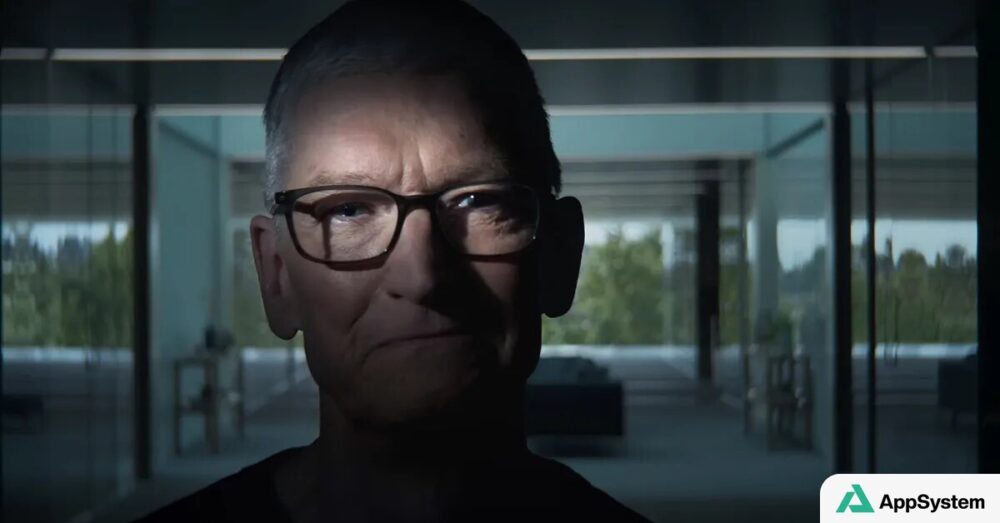 Portrait cinématographique d’un homme portant des lunettes dans un intérieur vitré