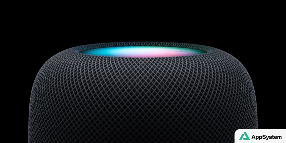 Gros plan sur un HomePod Apple avec éclairage Siri coloré