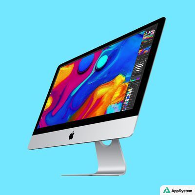 iMac Apple affichant une image colorée sur son écran