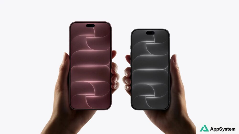 Deux iPhone 18 Pro de couleurs différentes tenus face caméra
