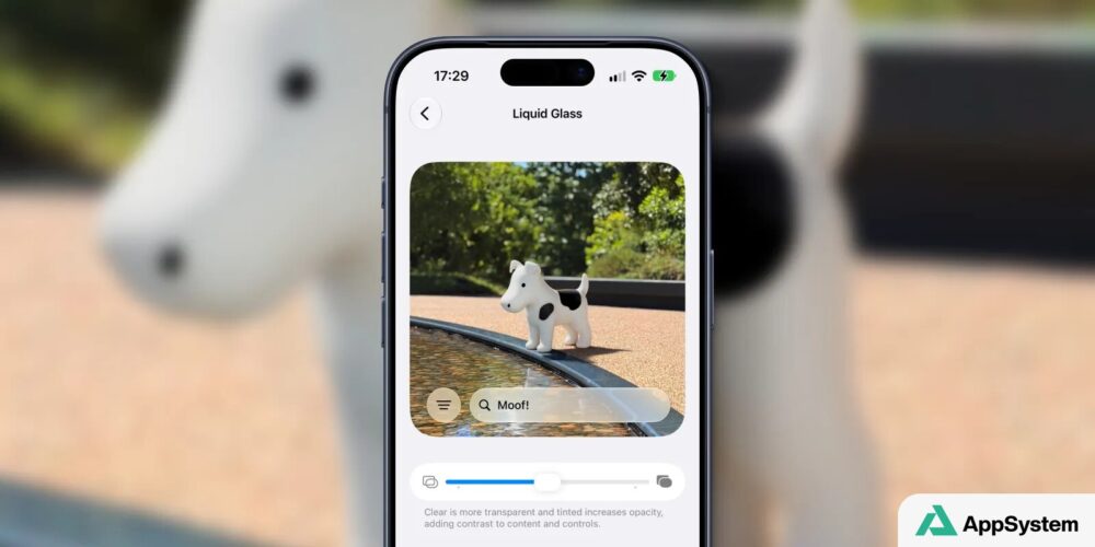 iPhone montrant l’écran Liquid Glass avec une figurine de chien