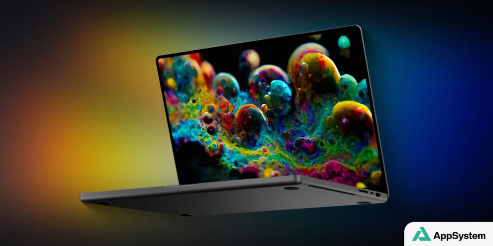 MacBook ouvert affichant une image colorée sur son écran