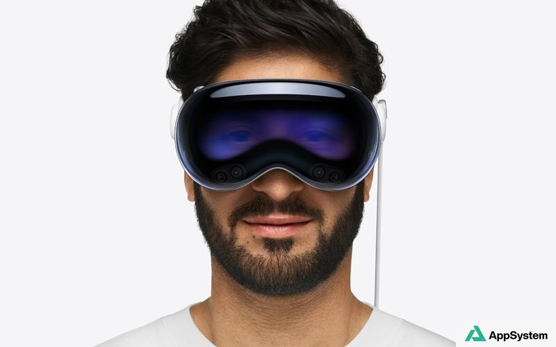 Apple Vision Pro porté par un homme, vue frontale du casque
