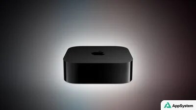 Boîtier Apple TV noir vu de face sur fond sombre