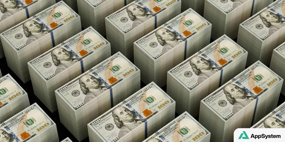 Piles de billets de 100 dollars symbolisant les recettes fiscales