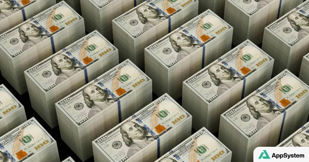 Piles de billets de 100 dollars symbolisant les recettes fiscales