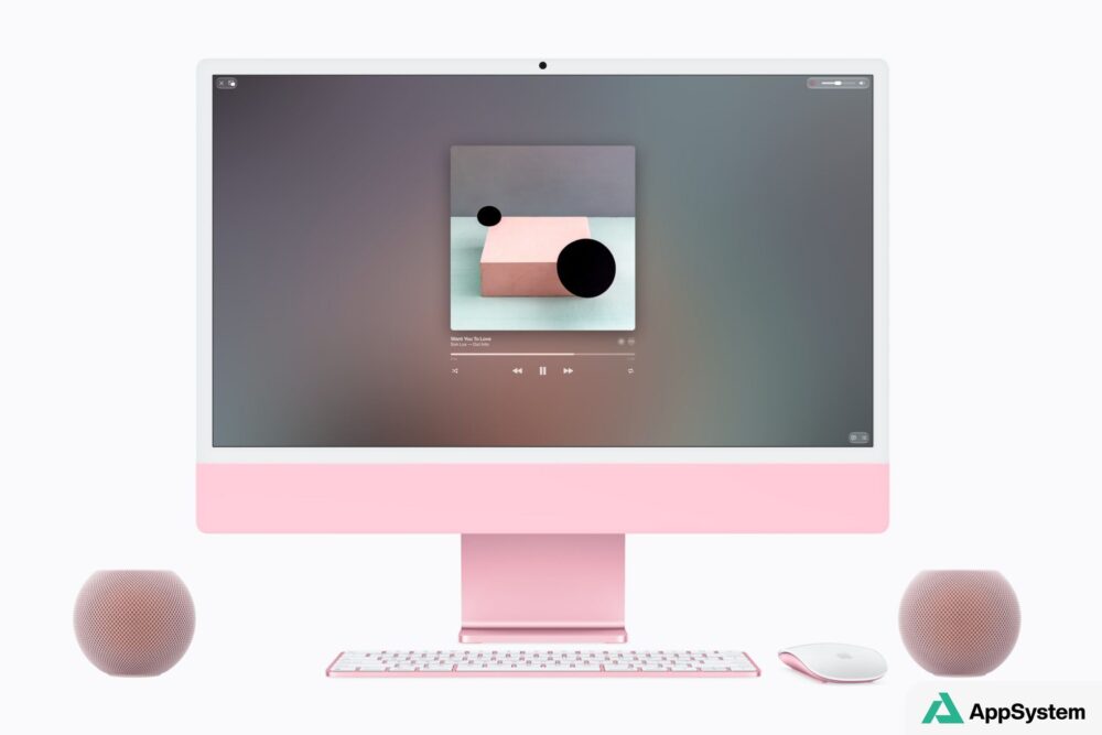 iMac rose entouré de deux HomePod mini pour le son stéréo