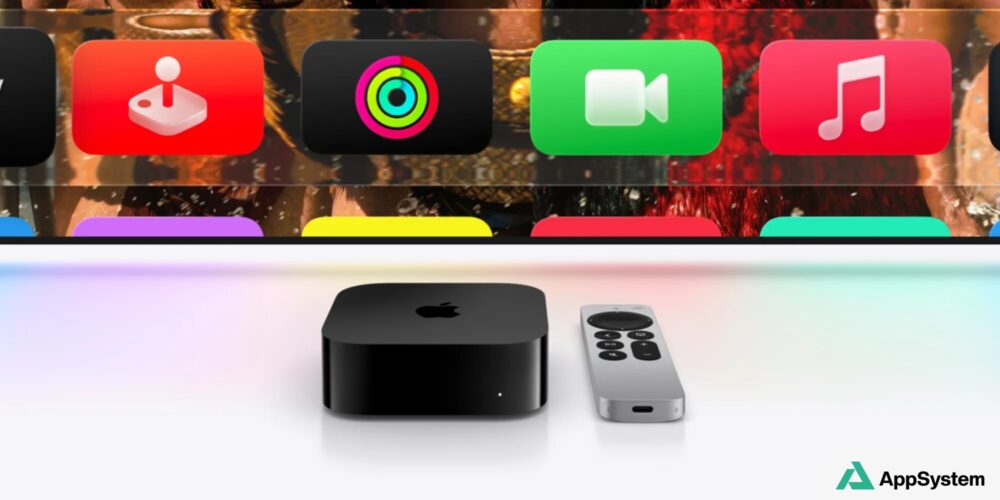 Apple TV 4K noire et télécommande devant l’écran d’accueil