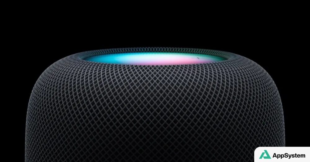 Gros plan sur une enceinte HomePod noire illuminée