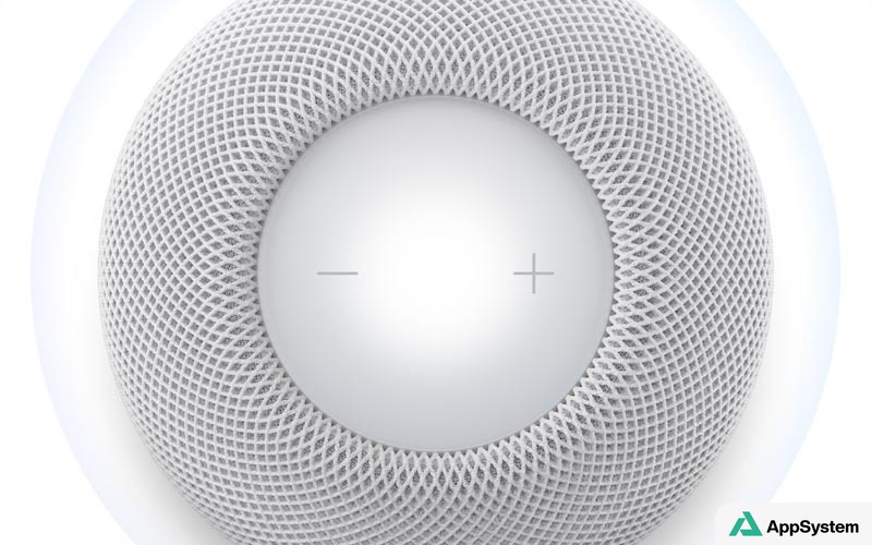 Gros plan sur le dessus d’un HomePod et ses commandes tactiles