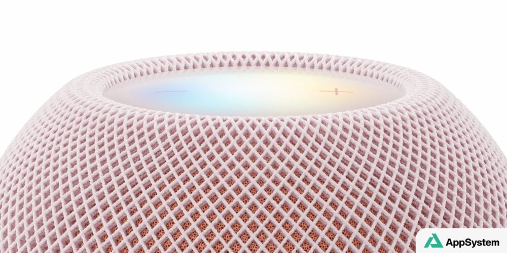 Gros plan sur le dessus tactile d’un HomePod mini rose