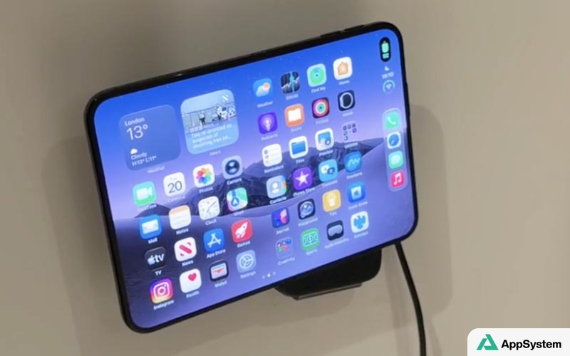 Smartphone posé sur un support vertical avec câble de recharge
