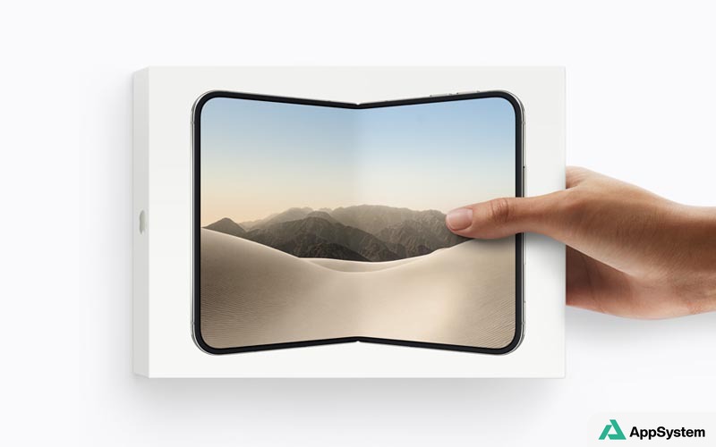 iPhone Duo pliable présenté devant sa boîte, tenu par une main