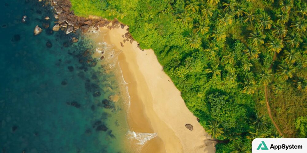 Écran de veille tvOS montrant une plage tropicale vue du ciel